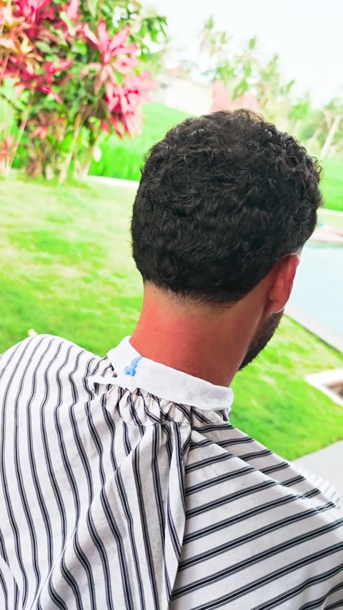 Natural curls with a tidy neckline