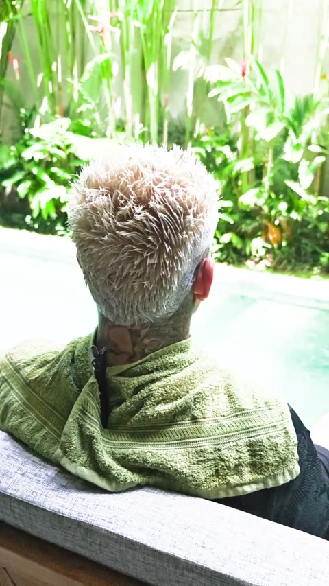 Light textured hair with closely tapered sides