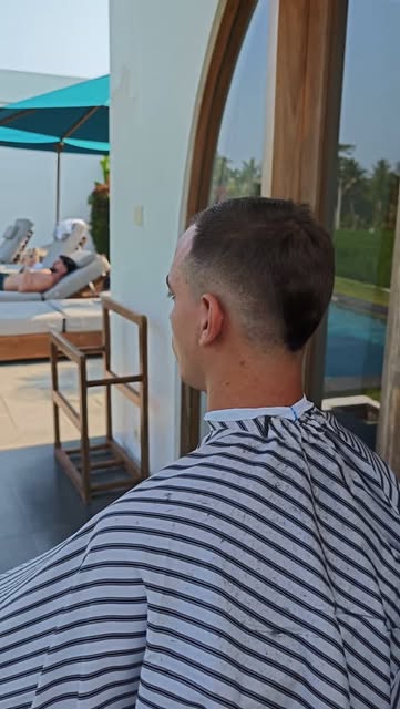 Fresh haircut at a poolside villa in Bali